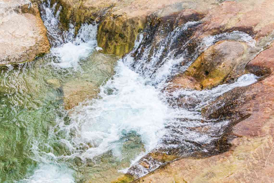 water flowing over rocks in the Frio river in texas