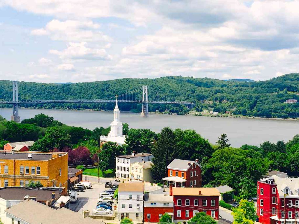 Houses and a church in Hyde Park, NY, on the Hudson River.