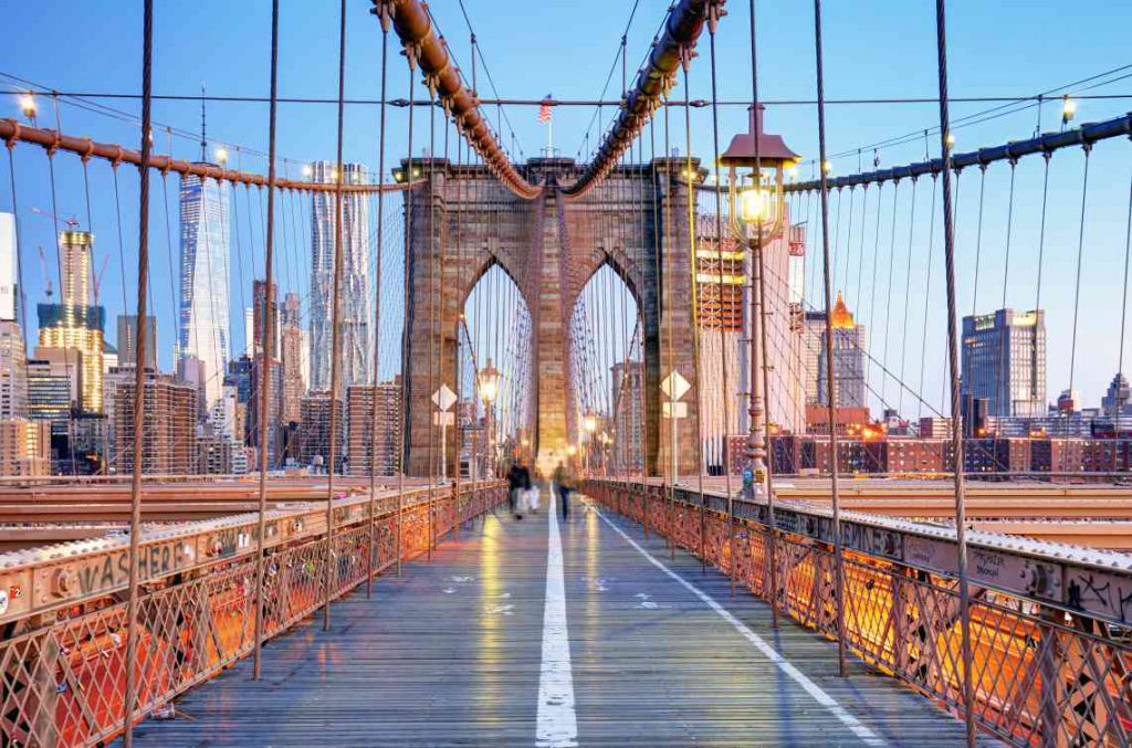 Brooklyn Bridge walkway with Manhattan skyscrapers in the background