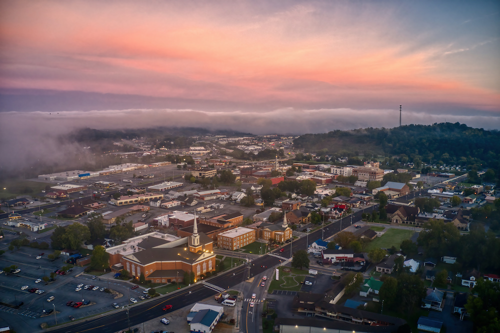 Aerial View of Sevierville, Tennessee on a Hazy Fall Sunrise | Glamping Destination | SIXT