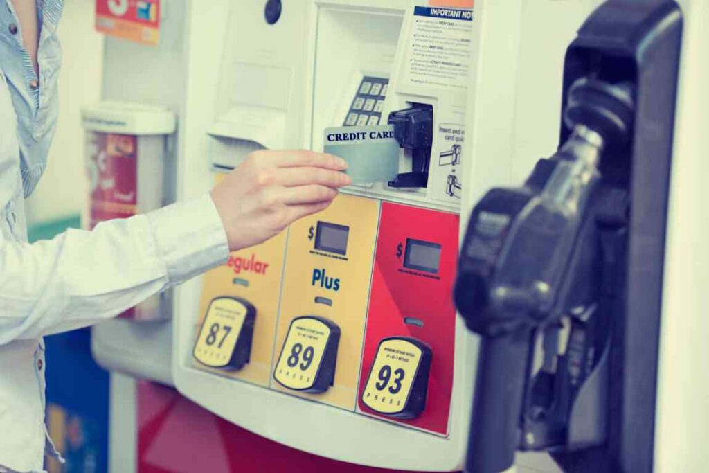 Credit card being inserted into gas pump