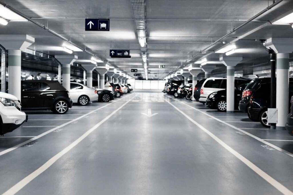 Row of cars in parking garage