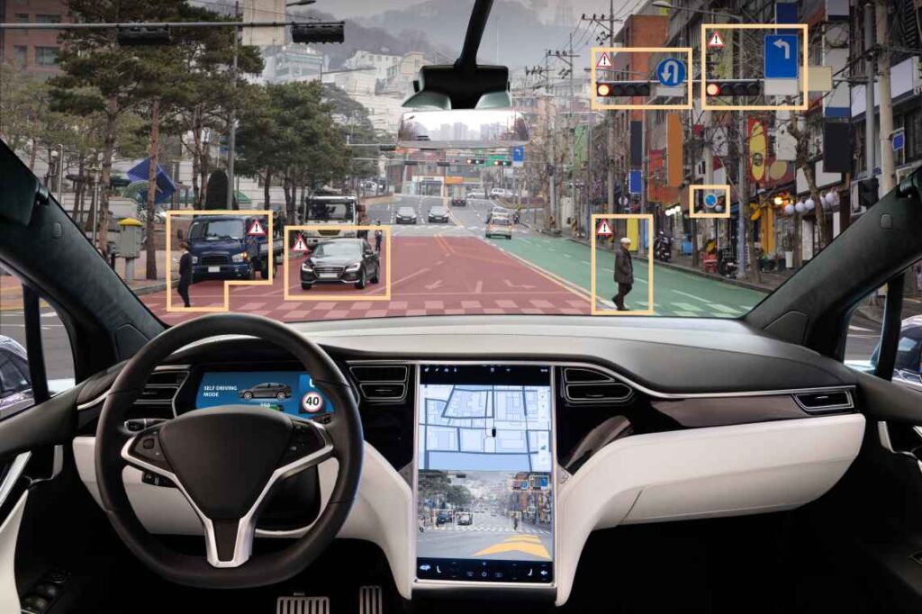 Self-driving car dashboard with potential dangers marked ahead