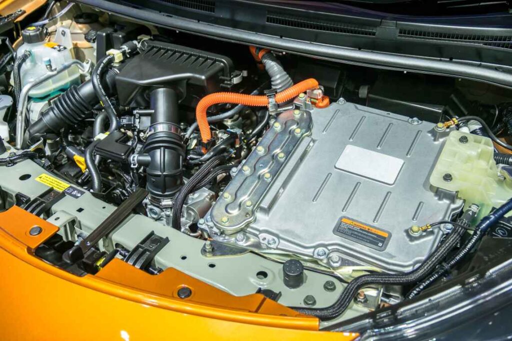 a hybrid car engine in an orange car