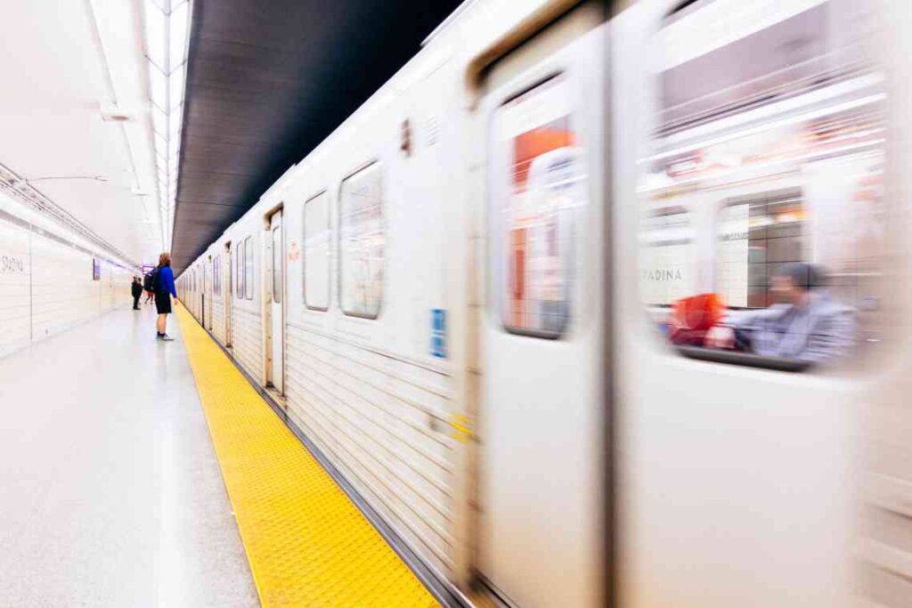 Woman waiting on platform for subway