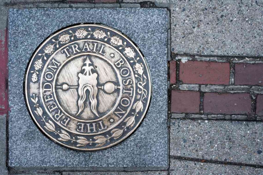 stone plaque in sidewalk for the freedom trail in boston