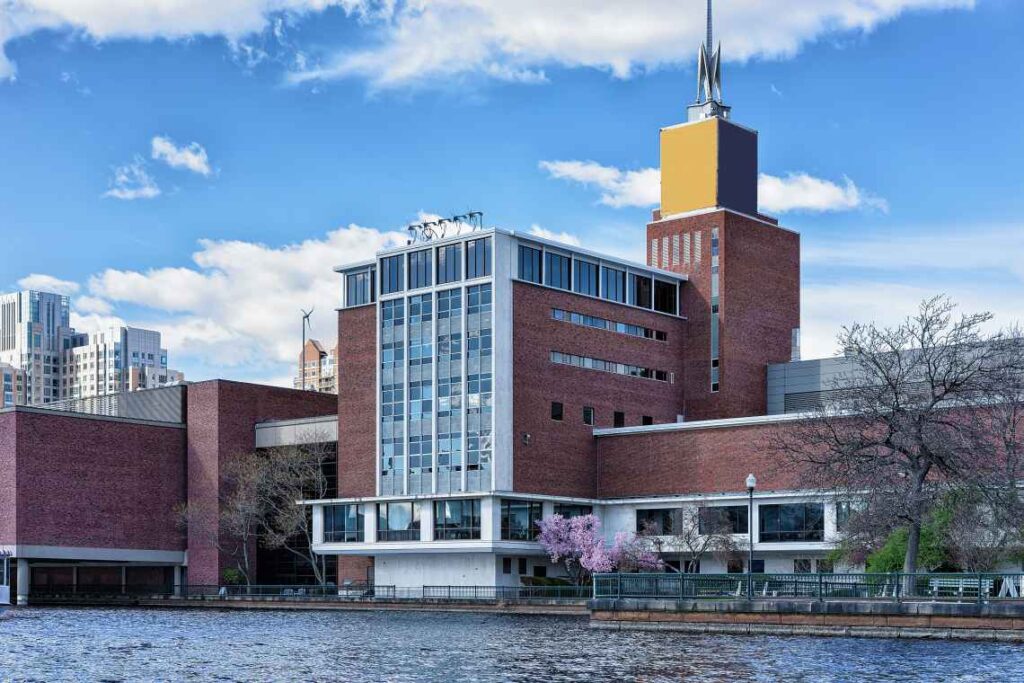 brick exterior of museum of science in boston along the charles river