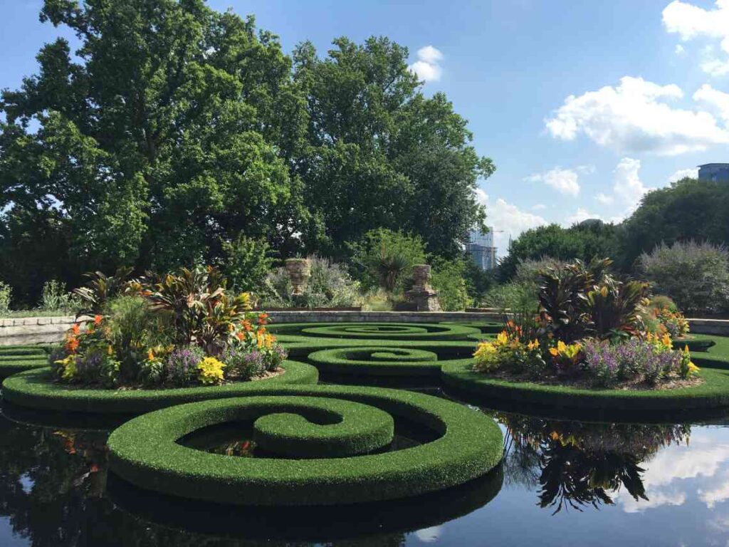 spirals with flowers floating on a pond in the atlanta botanical garden