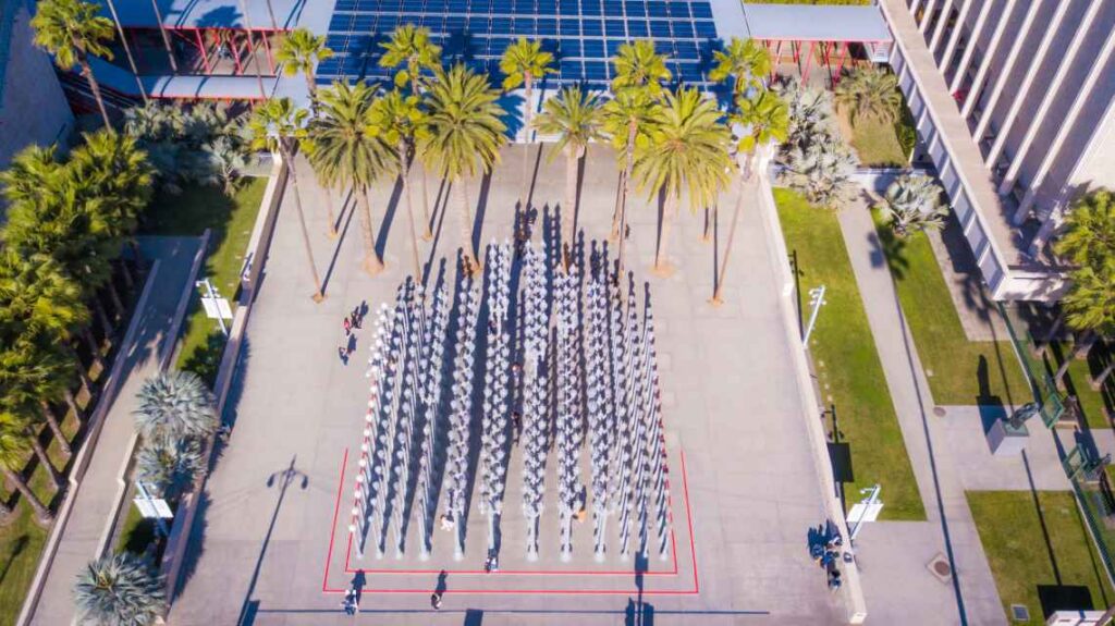 lamppost art installation from above in front of the los angeles county museum of art