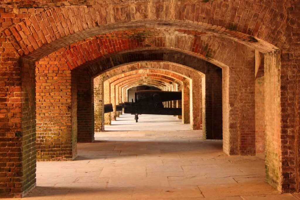 brick arches and black cannons at fort zachary taylor outside key west