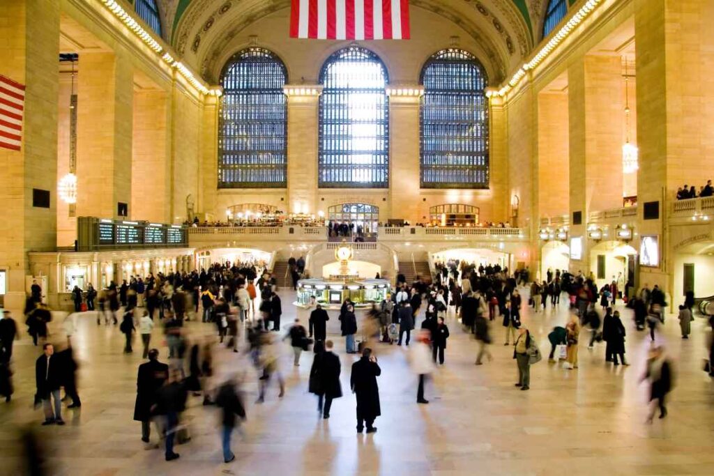 great hall of grand central terminal in nyc with people walking through