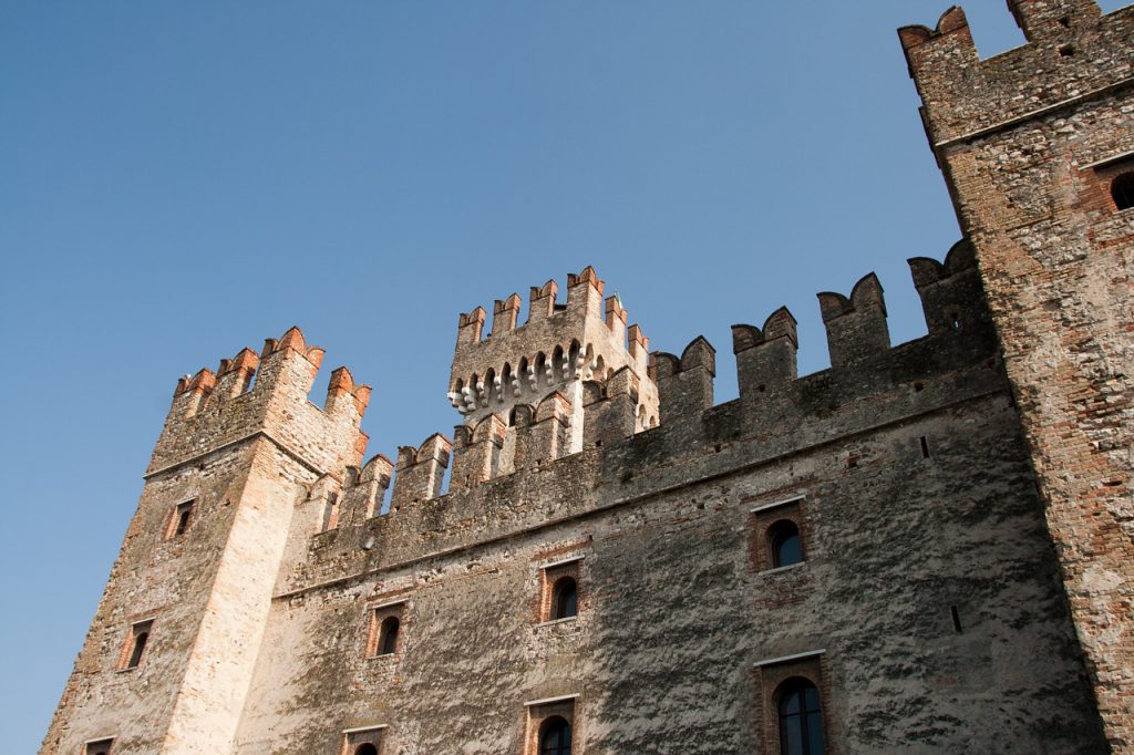 stone castle against blue sky in cremona, in the lombardy region of italy