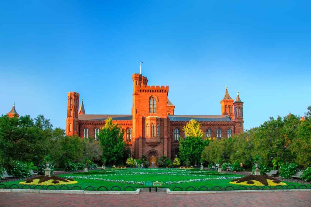 red brick smithsonian castle in the sunlight