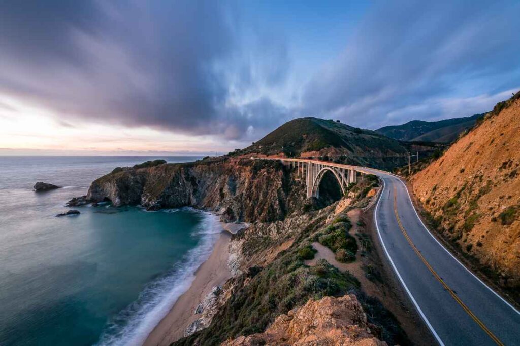 stretch of the pacific coast highway between monterey and big sur with pacific ocean on the left side