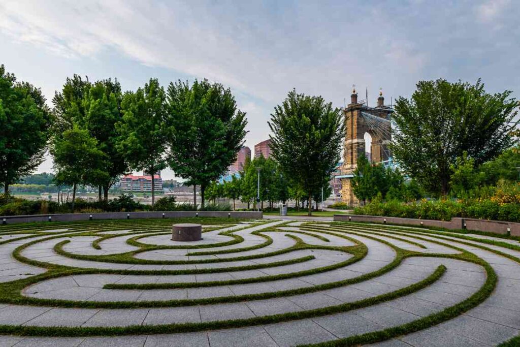 maze-like plaza with grass in smale riverfront park