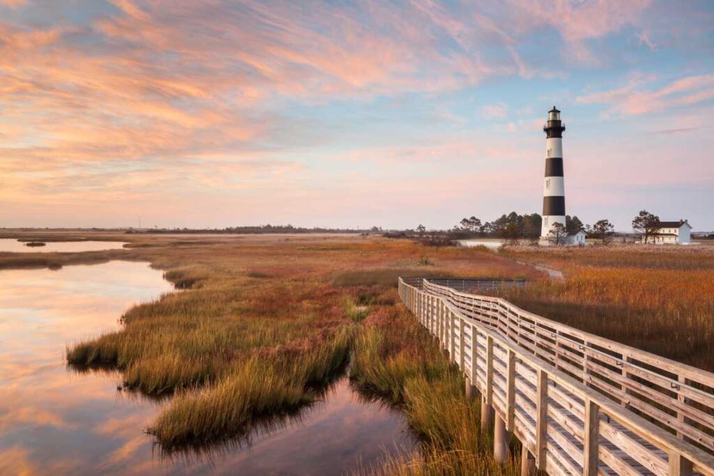 wooden walkway going over the grass toward bodie lighthouse on cape hatteras national seashore