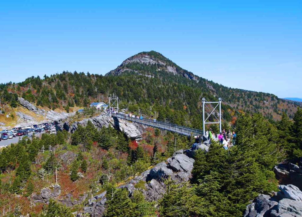 elevated metal walkway with grandfather mountain in the distance