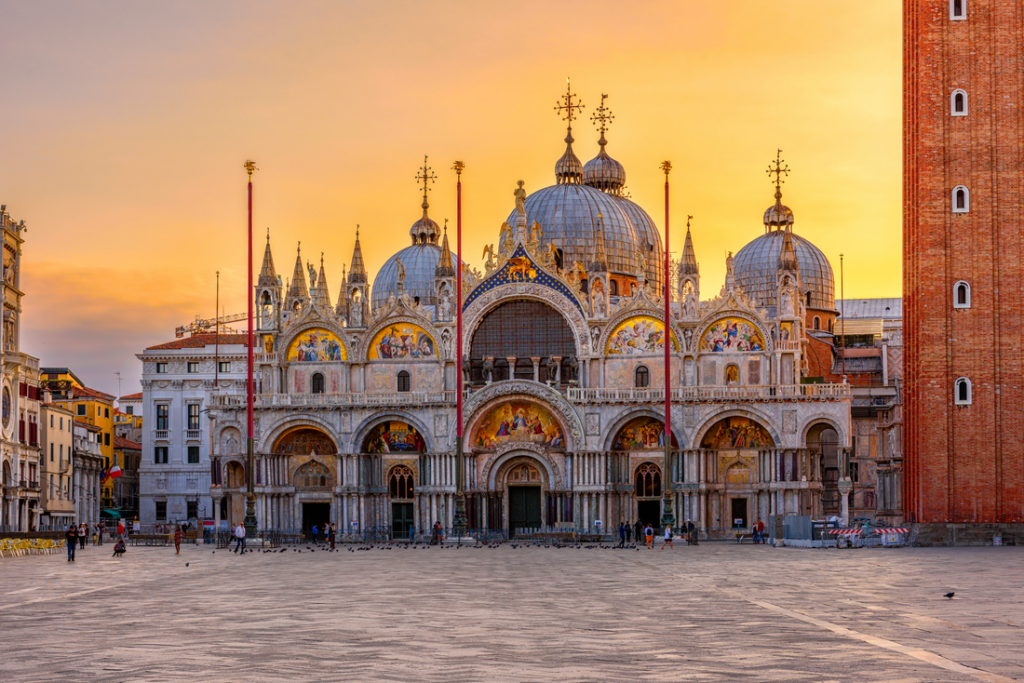 piazza and exterior of extravagent st. mark's basilica in venice