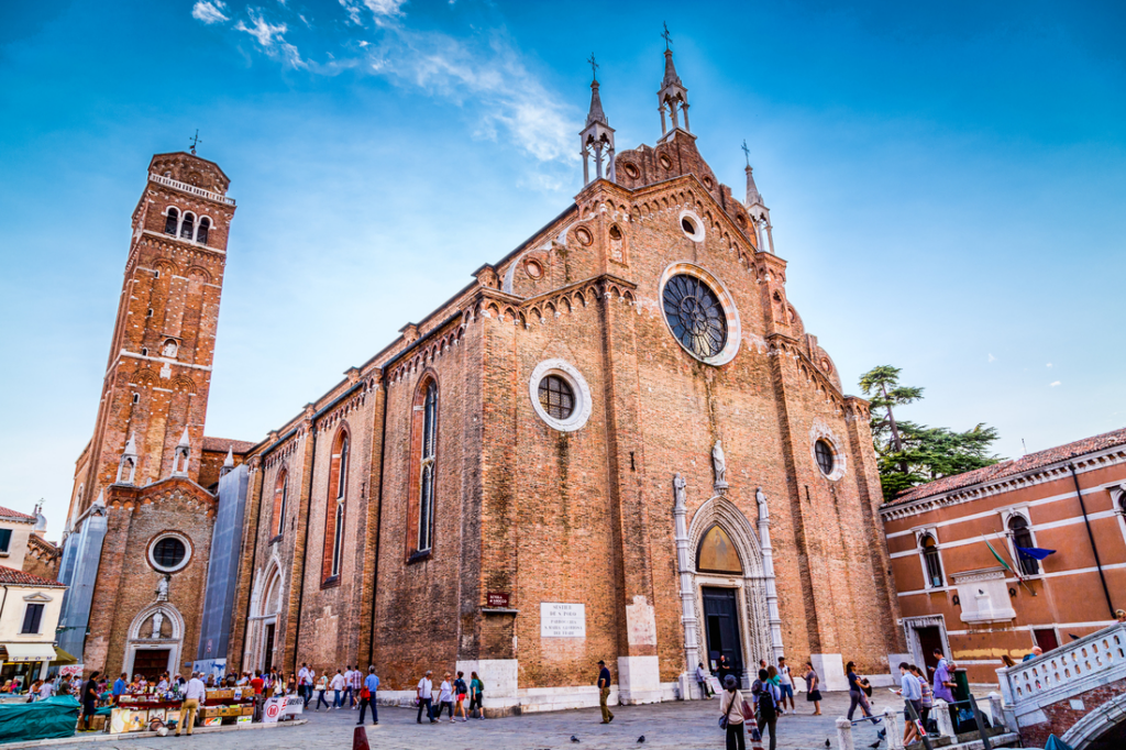 red stone outside of basilica dei frari in venice