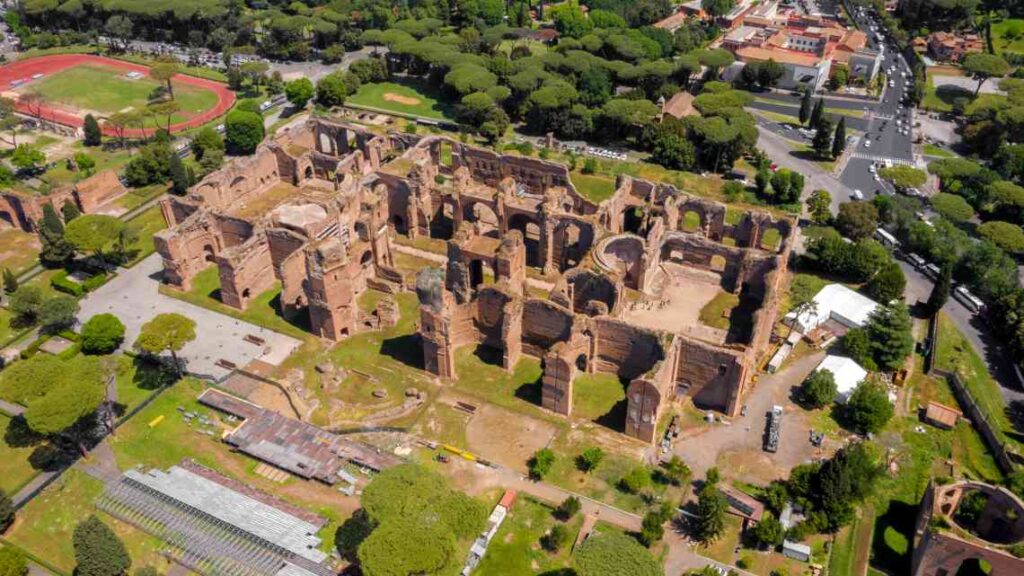 overhead view of ruins of brown stone ruins of baths of caracalla in rome