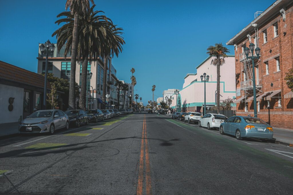 View of a city street in Santa Monica with cars parked on each side.
