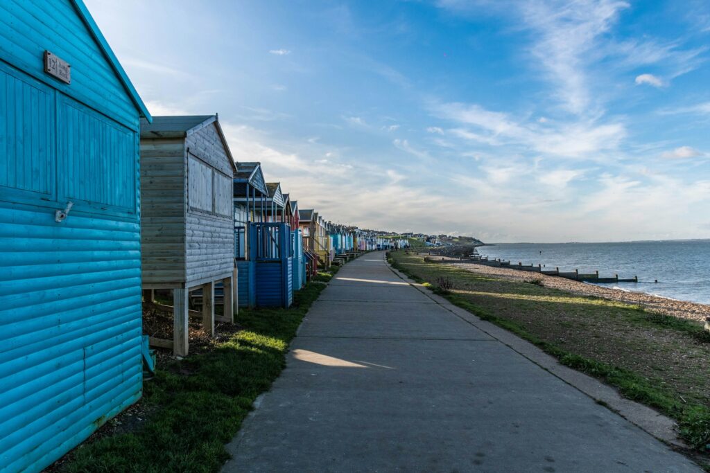 Houses near a beach viewing the blue sea in Whitstable.