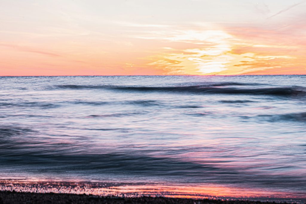Long exposure of a sunset over the beach at Presque Isle State Park, Pennsylvania.