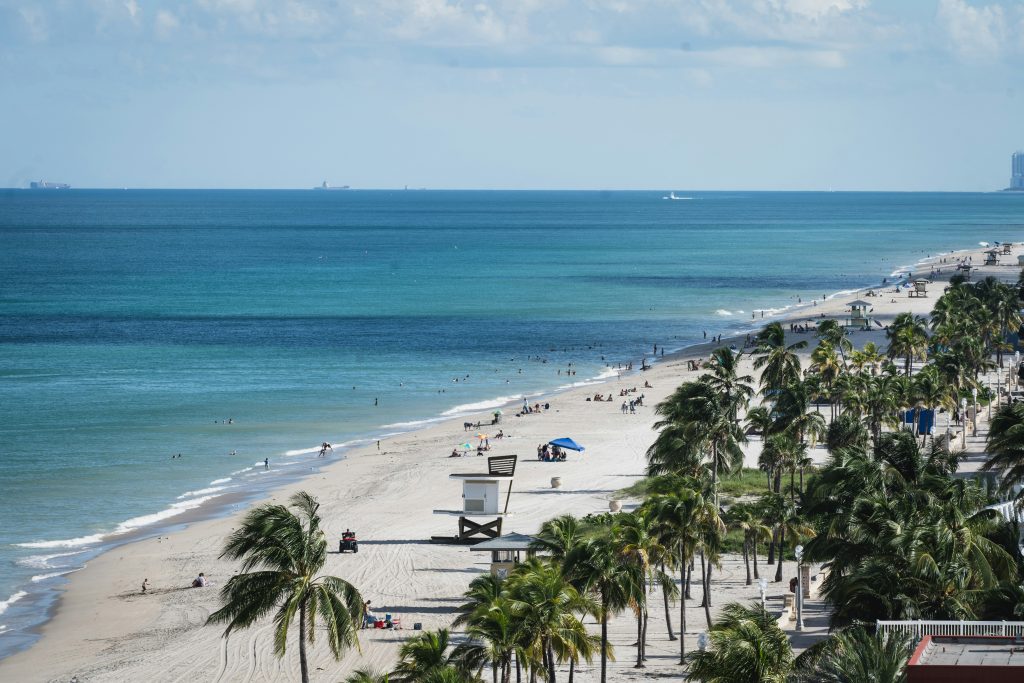 People on the beach during daytime at Hollywood Beach, Florida.